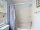 Bathroom featuring a shower, toilet and decor on window shelving at 1432 Windjammer Pl, Valrico, FL 33594