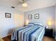 Bright bedroom featuring ceiling fan, neutral walls, and closet at 1432 Windjammer Pl, Valrico, FL 33594