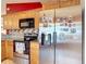 Modern kitchen featuring stainless steel appliances and stylish cabinets at 1432 Windjammer Pl, Valrico, FL 33594