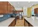 Bright kitchen with stainless steel appliances and ample counter space at 1709 Sunset Dr, Tarpon Springs, FL 34689