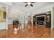 Spacious living room with hardwood floors and a built-in entertainment center at 1709 Sunset Dr, Tarpon Springs, FL 34689