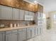 Efficient kitchen layout with modern appliances and plenty of storage space at 18514 Hidden Pines Way, Hudson, FL 34667