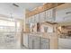 Well-lit kitchen featuring modern appliances, plenty of countertop space, and a breakfast nook at 18514 Hidden Pines Way, Hudson, FL 34667