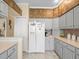 Efficient kitchen layout with modern appliances and plenty of storage space at 18514 Hidden Pines Way, Hudson, FL 34667