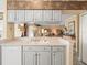 Open-concept kitchen with views to living areas, perfect for entertaining and Gathering living at 18514 Hidden Pines Way, Hudson, FL 34667