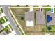 An aerial view shows the neighborhood's neatly arranged homes and well-maintained lawns at 1876 Colding Dr, Ruskin, FL 33570