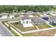 Aerial view of the property highlighting the fenced backyard, patio, and neighborhood setting at 1876 Colding Dr, Ruskin, FL 33570