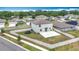 Aerial shot of fenced backyard featuring a trampoline and patio in a residential neighborhood at 1876 Colding Dr, Ruskin, FL 33570
