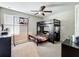 This is a bedroom with a bunk bed, basketball hoop, ceiling fan, and neutral color scheme at 1876 Colding Dr, Ruskin, FL 33570