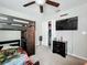 Bedroom features bunk bed, closet, dresser and ceiling fan at 1876 Colding Dr, Ruskin, FL 33570