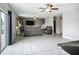 Spacious living room featuring neutral colors, recessed lighting and an exit to backyard at 1876 Colding Dr, Ruskin, FL 33570