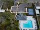 A community pool with a pool house, a basketball court, and a parking lot at 1876 Colding Dr, Ruskin, FL 33570