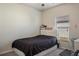 Bedroom featuring a twin bed and desk setup for a cozy and functional space at 19041 Alfaro Loop, Spring Hill, FL 34610