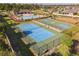 Aerial view showcasing community tennis, basketball, and playground areas at 19041 Alfaro Loop, Spring Hill, FL 34610