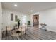 Open dining area with modern decor, seamlessly connected to the updated kitchen at 202 Cranberry Ln, Brandon, FL 33510