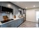 Modern kitchen featuring stainless steel appliances, white countertops, and gray cabinetry at 202 Cranberry Ln, Brandon, FL 33510