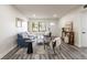 A well-appointed living room with modern decor, sleek flooring, and plenty of natural light at 202 Cranberry Ln, Brandon, FL 33510