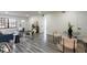 Open-concept living space with dining area, modern furnishings, and plenty of natural light at 202 Cranberry Ln, Brandon, FL 33510