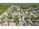 Residential aerial showcasing the neighborhood, nearby lakes, and the home's positioning at 20404 Autumn Fern Ave, Tampa, FL 33647