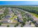 This home boasts a spacious backyard and a prime location near a tree-lined street in a vibrant community at 20404 Autumn Fern Ave, Tampa, FL 33647