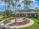 This home features access to a beautiful community clubhouse, fountain, and lush landscaping at 20404 Autumn Fern Ave, Tampa, FL 33647