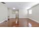 Spacious living room offers wood floors, neutral walls, recessed lighting, and natural light at 20404 Autumn Fern Ave, Tampa, FL 33647
