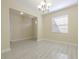 Expansive living room with new floors, plenty of natural light, and neutral color palette at 20404 Autumn Fern Ave, Tampa, FL 33647