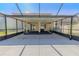 Wide view of screened-in patio showing outdoor space at 20404 Autumn Fern Ave, Tampa, FL 33647