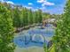 Aerial shot of community playground featuring multiple play areas and equipment for all ages at 20404 Autumn Fern Ave, Tampa, FL 33647