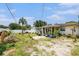 Backyard with a partial view of the house at 2078 Shadow Ln, Clearwater, FL 33763