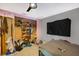 Cluttered bedroom with a fan and an open closet at 2078 Shadow Ln, Clearwater, FL 33763
