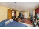 Untidy bedroom with various items scattered around at 2078 Shadow Ln, Clearwater, FL 33763
