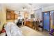 Kitchen needing renovation with wooden cabinets, stainless steel appliances, and work space at 2078 Shadow Ln, Clearwater, FL 33763