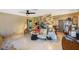 Bright living area with colorful accent wall, ceiling fan, and room for personalization at 2078 Shadow Ln, Clearwater, FL 33763