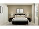 This bedroom features a neutral color palette, providing a soothing space at 2288 Blue Grosbeak Pl, Wimauma, FL 33598