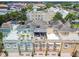 Townhomes with rooftop patios, bay windows, and convenient garages at 2305 Victoria Gardens Ln, Tampa, FL 33609