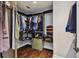 Organized walk-in closet with custom shelving and ample storage space at 2305 Victoria Gardens Ln, Tampa, FL 33609