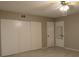 Bedroom boasts a ceiling fan, mirrored door, and large closet space at 2360 World Parkway Blvd # 36, Clearwater, FL 33763