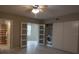 Bedroom offers ample closet space, bathroom access, and a washer at 2360 World Parkway Blvd # 36, Clearwater, FL 33763