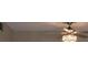 Close up of a modern ceiling fan with a decorative light fixture at 2360 World Parkway Blvd # 36, Clearwater, FL 33763