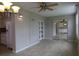 Spacious dining area with new flooring, ample lighting, and views into the adjoining kitchen, ideal for entertaining at 2360 World Parkway Blvd # 36, Clearwater, FL 33763