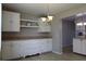 Eat-in kitchen features built-in cabinets and drawers, under cabinet lighting and a dining area, perfect for meals at 2360 World Parkway Blvd # 36, Clearwater, FL 33763