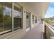 Inviting condo entrance with natural light streaming through the window at 2426 Persian Dr # 52, Clearwater, FL 33763