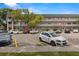 Well-maintained condo complex with ample parking and mature trees at 2426 Persian Dr # 52, Clearwater, FL 33763