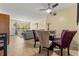Spacious living and dining area with modern lighting and tile flooring at 2426 Persian Dr # 52, Clearwater, FL 33763