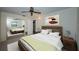 Cozy bedroom features a comfortable bed with neutral decor and mirrored closet doors for added space at 2880 81St N St, St Petersburg, FL 33710