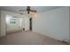 Cozy bedroom featuring neutral carpet and a mirrored closet at 2880 81St N St, St Petersburg, FL 33710