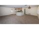 Inviting living space with neutral carpet and an open kitchen layout at 2880 81St N St, St Petersburg, FL 33710