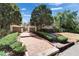 Charming exterior view with a brick path and lush landscaping, creating a serene and private entrance at 308 S Bungalow Park Ave # B, Tampa, FL 33609