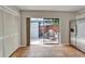 Bright kitchen with access to the patio, stainless steel refrigerator, and tile floor at 308 S Bungalow Park Ave # B, Tampa, FL 33609